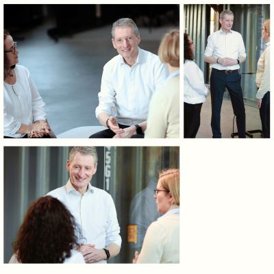 Mitarbeiter bei einem Business-Shooting im Unternehmen natürliche Gesprächssituationen und Mitarbeiterporträts